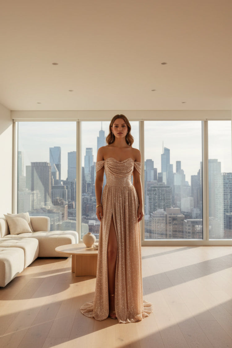 Elegant off-shoulder gown with a high slit on a gray background